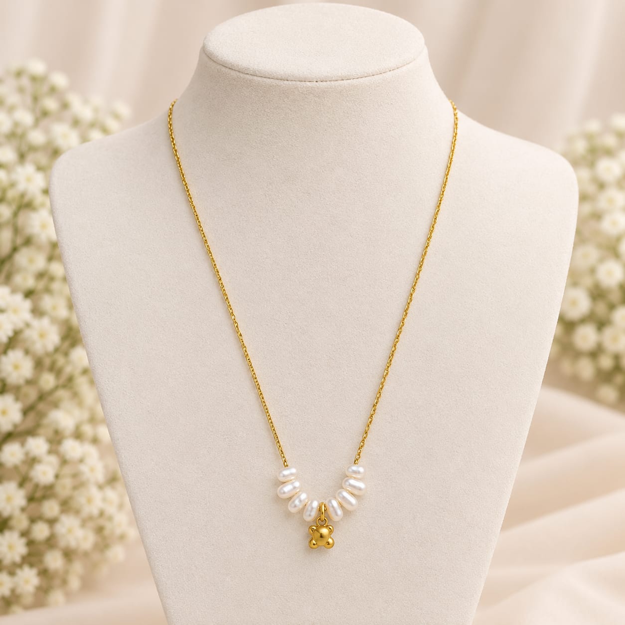 WhatsApp Image 2026-09-07 at 6.33.06 AM (1) Elegant Pearl & Gold Charm Necklace - Image 1
